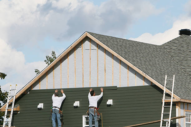 Professional Siding technician working in Lebanon, CT